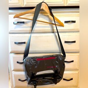 Patagonia Messenger bag. Gray and pink. Fits a small laptop.
